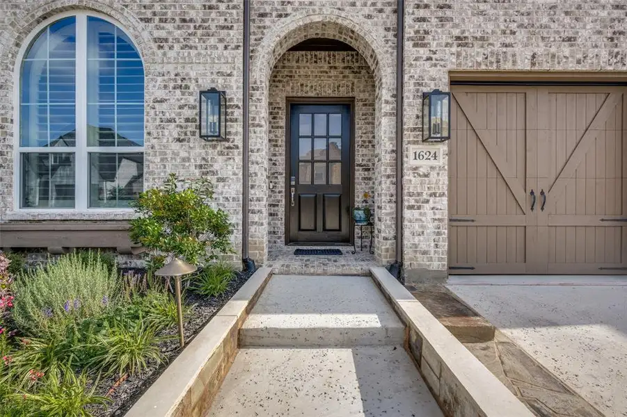 Exterior details and patio area of a home in Harvest, Northlake (Image 2). Exterior details and patio area of a home in Harvest, Northlake (Image 2).