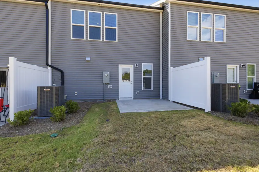 Exterior details and patio area of a home in Carpenter Falls, Durham (Image 4).