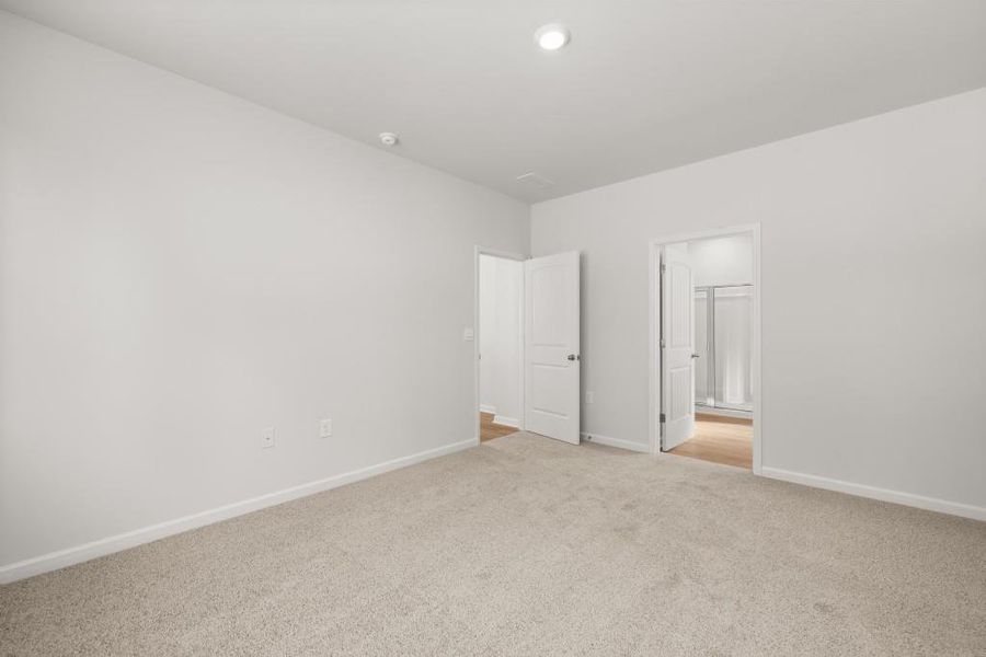 Spacious, unfurnished interior of a new home in Northwoods at Mirror Lake, Villa Rica (Image 32).