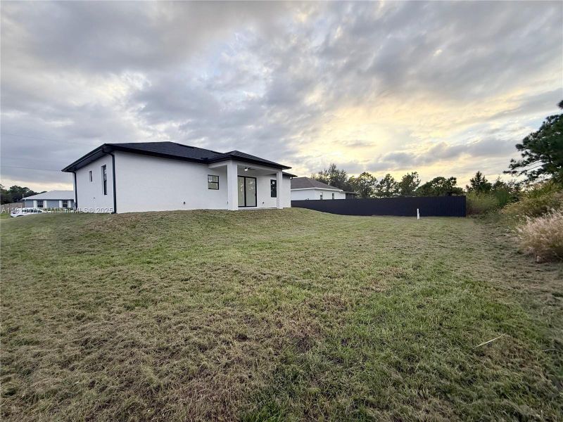 Exterior details and patio area of a home in , Lehigh Acres (Image 22). Exterior details and patio area of a home in , Lehigh Acres (Image 22).