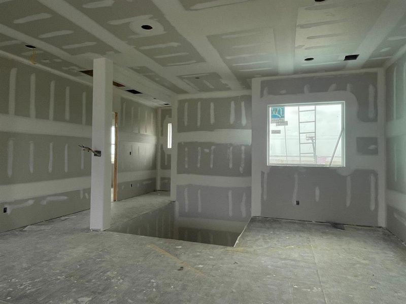 From this angle, you can see the open layout upstairs with space for a cozy reading nook beneath the stairs and elevator access just behind—showcasing the blend of design and function throughout the home. From this angle, you can see the open layout upstairs with space for a cozy reading nook beneath the stairs and elevator access just behind—showcasing the blend of design and function throughout the home.