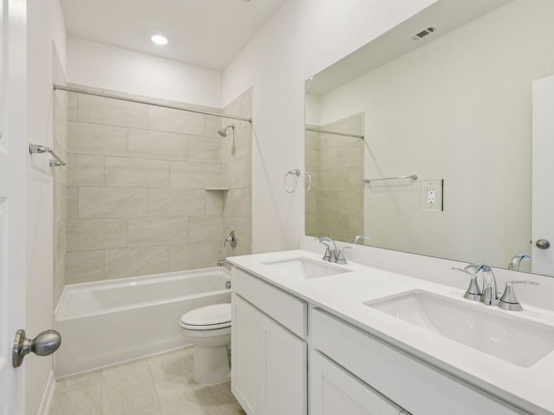 Guest bathroom in the Allen floorplan at a Meritage Homes community. Guest bathroom in the Allen floorplan at a Meritage Homes community.