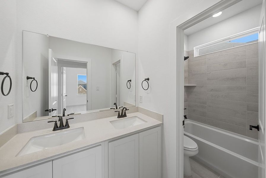 Furnished interior view inside a new home in Light Farms Brenham - 40' Lots, Celina (Image 12).