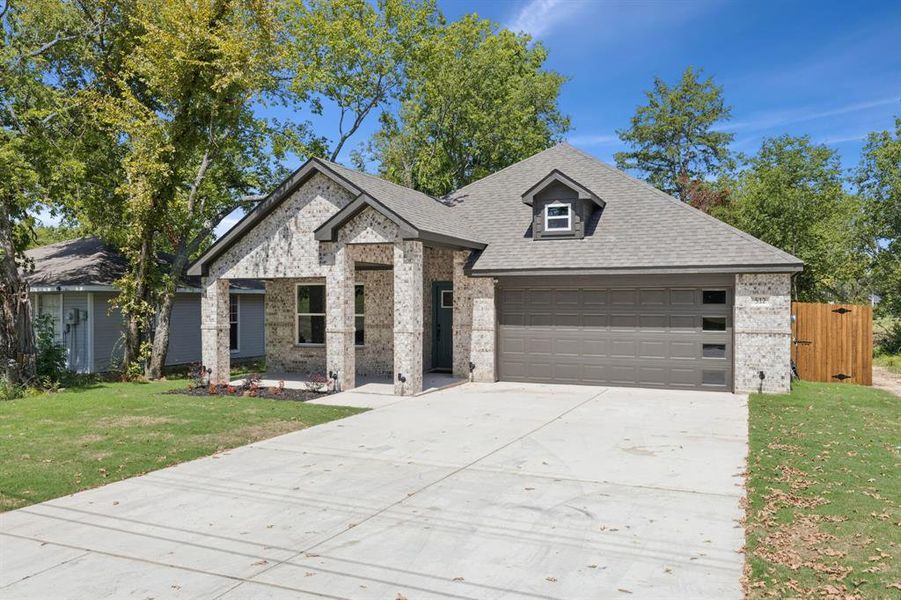 Front exterior of a new home in , Terrell, TX, highlighting curb appeal (Image 20).