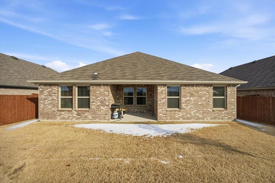 Exterior details and patio area of a home in Stonehaven, Caddo Mills (Image 22).