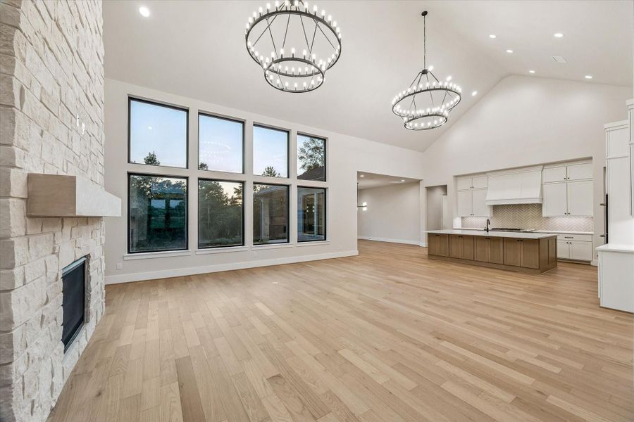 Living Area, Kitchen, and Dining Area. Living Area, Kitchen, and Dining Area.