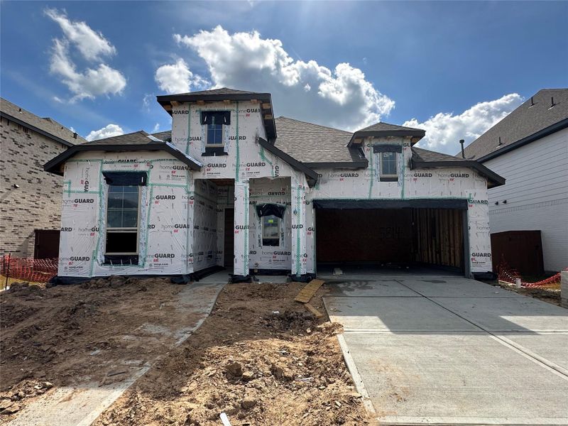 In-progress construction of a new home in Meridiana, Manvel, TX (Image 6).