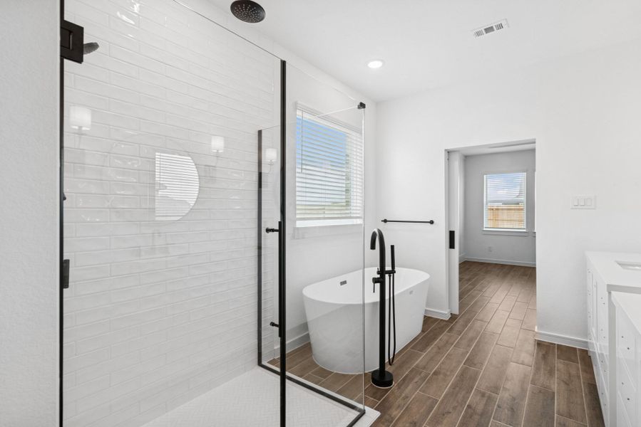 Relaxing soaker tub and large shower