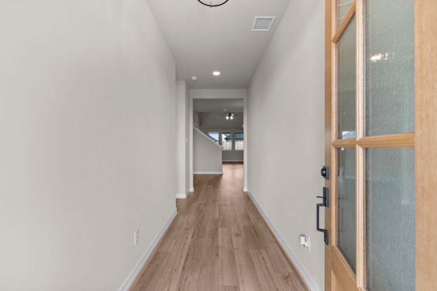 Home entry. Sample product photo. Actual exterior and interior selections may vary by homesite. Photo may be virtually staged.