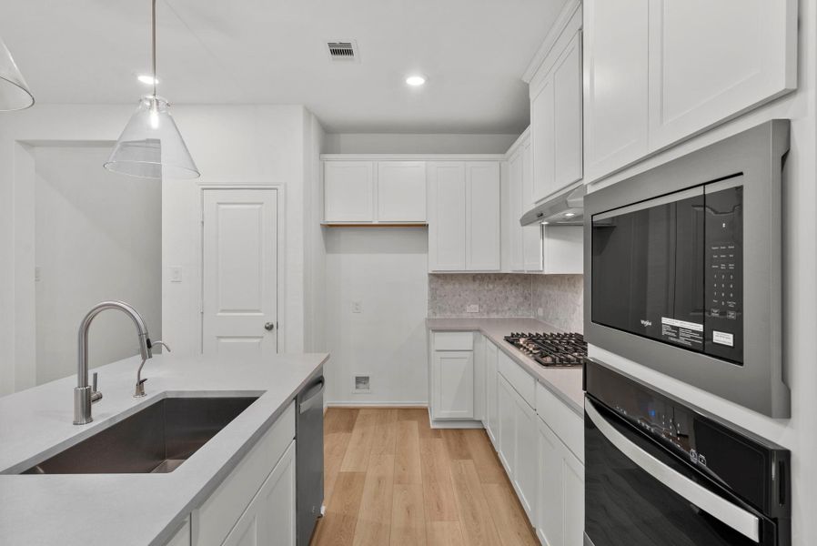 Furnished interior view inside a new home in The Highlands, Porter (Image 5).