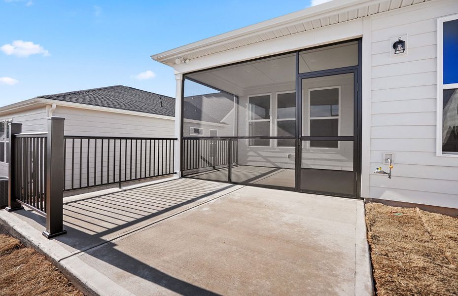 Exterior details and patio area of a home in Carolina Riverside, Belmont (Image 4).