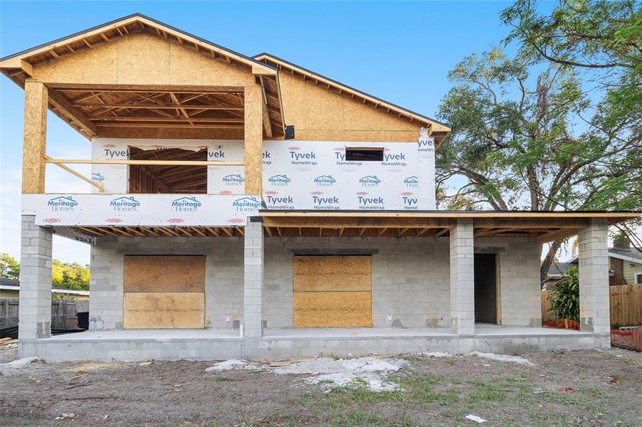 Front exterior of a new home in , Tampa, FL, highlighting curb appeal (Image 17).