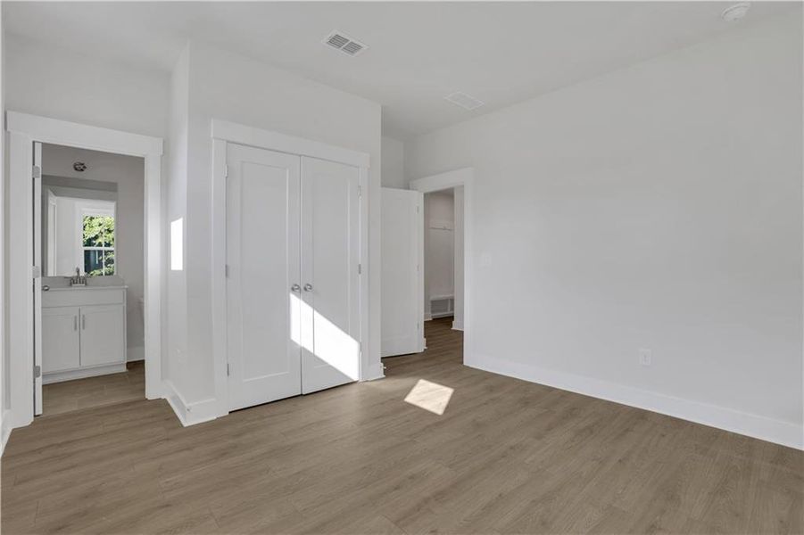 Spacious, unfurnished interior of a new home in The Paddocks at Doc Hughes, Buford (Image 30).