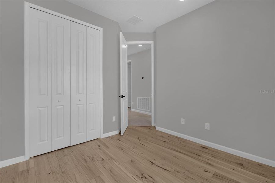 Spacious, unfurnished interior of a new home in Seasons at Lakeside Forest, Tavares (Image 40).