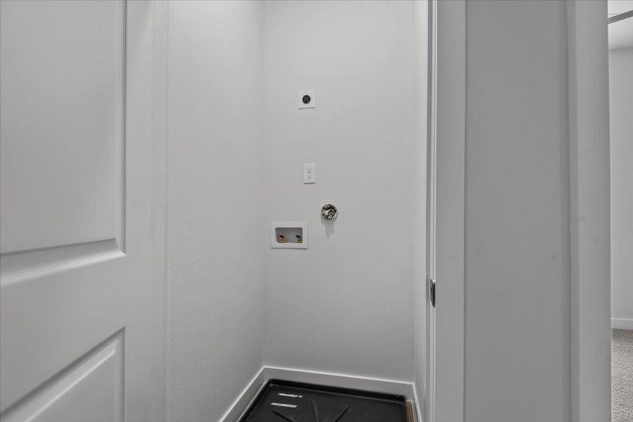 Thoughtfully located upstairs, the utility room ensures effortless laundry access and everyday ease Thoughtfully located upstairs, the utility room ensures effortless laundry access and everyday ease