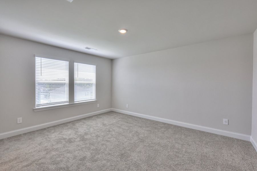 The primary suite offers a private retreat. The primary suite offers a private retreat.