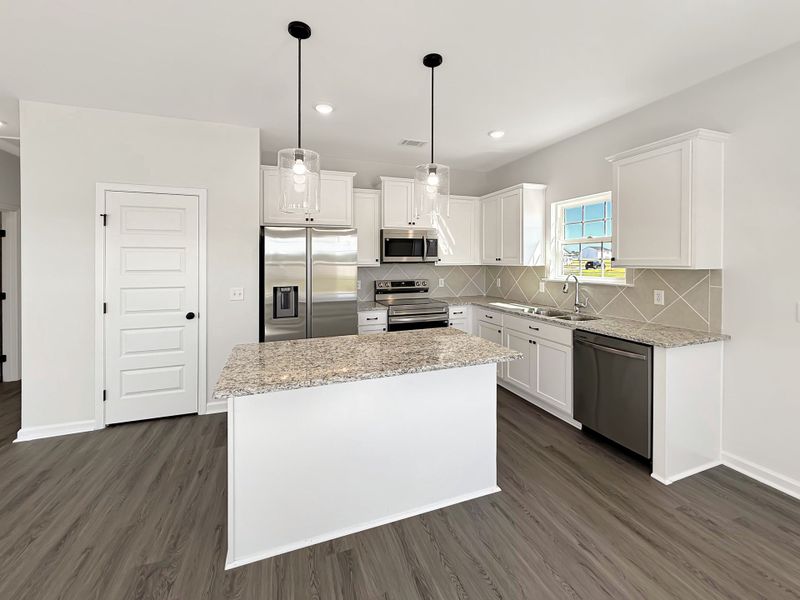 Furnished interior view inside a new home in The Village at Sassafras, Allenhurst (Image 6).