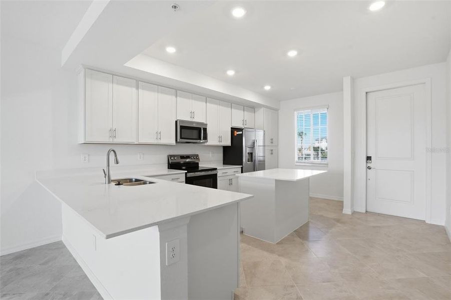 Furnished interior view inside a new home in Wellen Park Golf & Country Club, Venice (Image 8). Furnished interior view inside a new home in Wellen Park Golf & Country Club, Venice (Image 8).