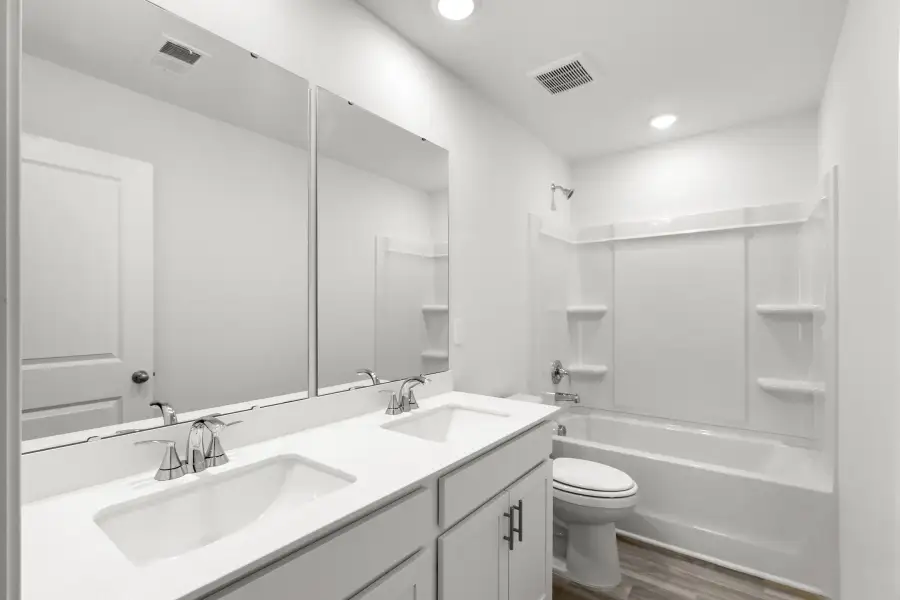Furnished interior view inside a new home in Waterside - Boardwalk Series, Longs (Image 6).