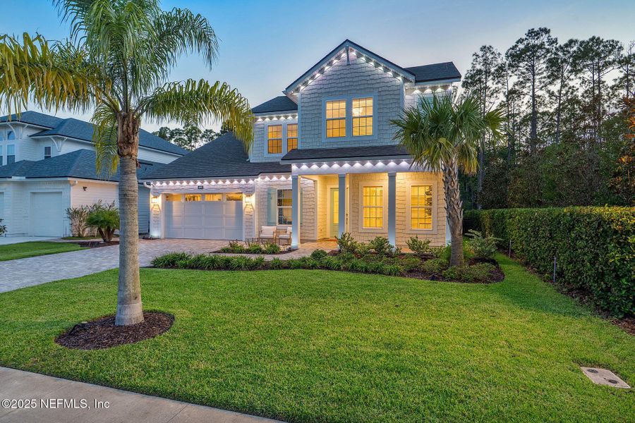 Front exterior of a new home in Palm Crest AT Seabrook, Ponte Vedra, FL, highlighting curb appeal (Image 25).