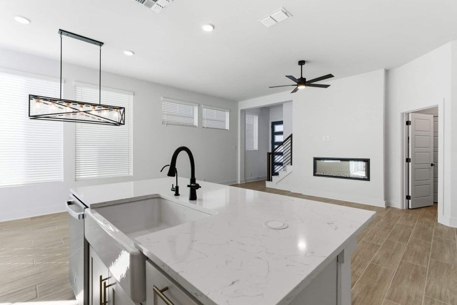 Furnished interior view inside a new home in Centero at Stone Oak, San Antonio (Image 10).