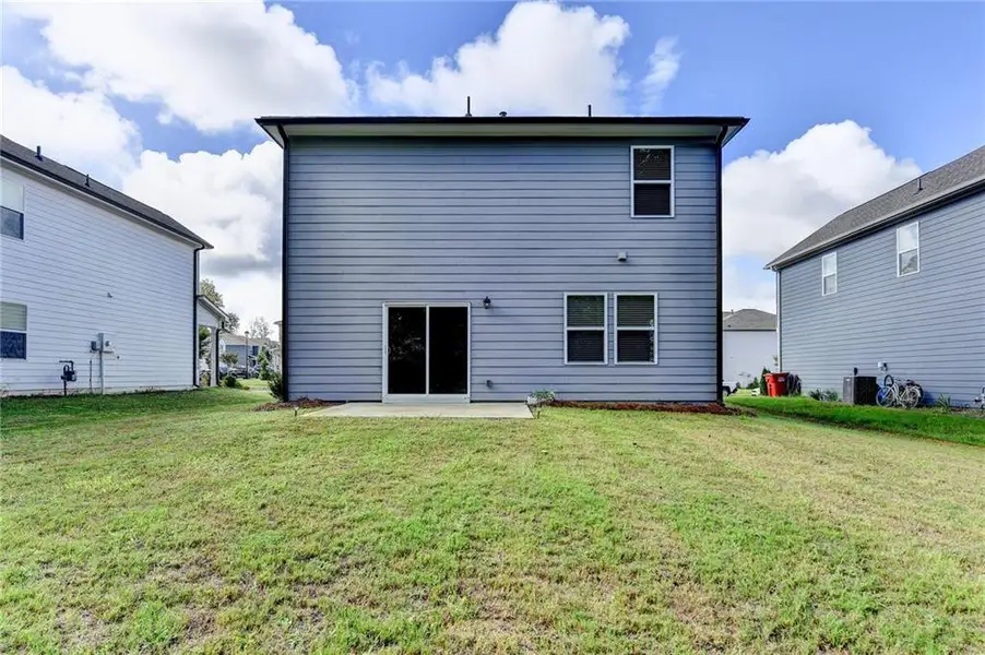Front exterior of a new home in , Braselton, GA, highlighting curb appeal (Image 2).