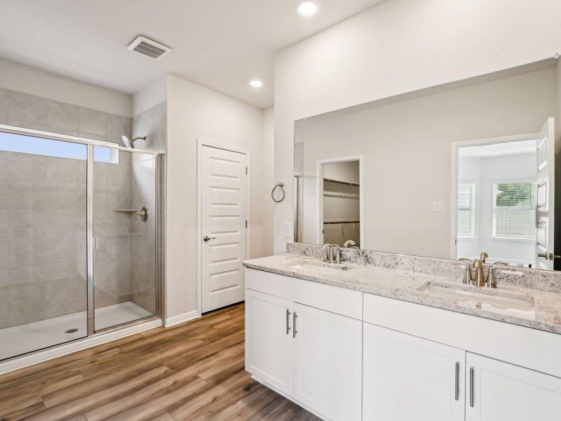 Furnished interior view inside a new home in Riverbend at Double Eagle - Boulevard Collection, Cedar Creek (Image 12). Furnished interior view inside a new home in Riverbend at Double Eagle - Boulevard Collection, Cedar Creek (Image 12).