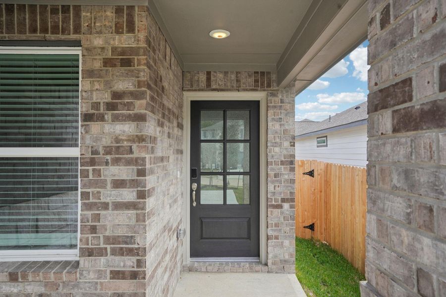 Exterior details and patio area of a home in Pine Lake Cove - Traditional Series, Montgomery (Image 25).
