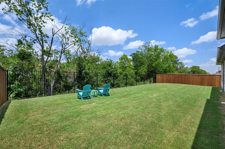 Exterior details and patio area of a home in Sonoma Verde, McLendon-Chisholm (Image 21).