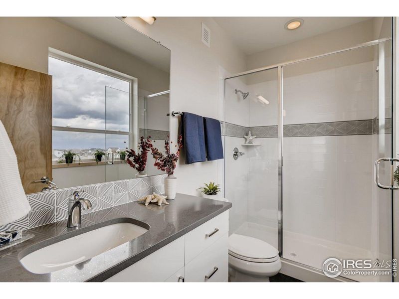 Primary Bathroom. Photos are of the model home.