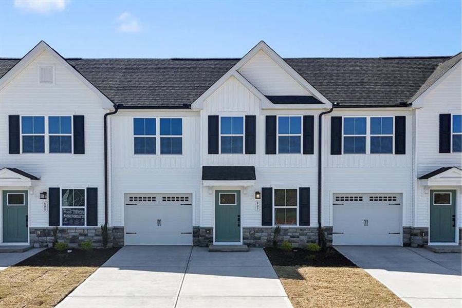 Front exterior of a new home in Beech Glen, Anderson, SC, highlighting curb appeal (Image 1). Front exterior of a new home in Beech Glen, Anderson, SC, highlighting curb appeal (Image 1).