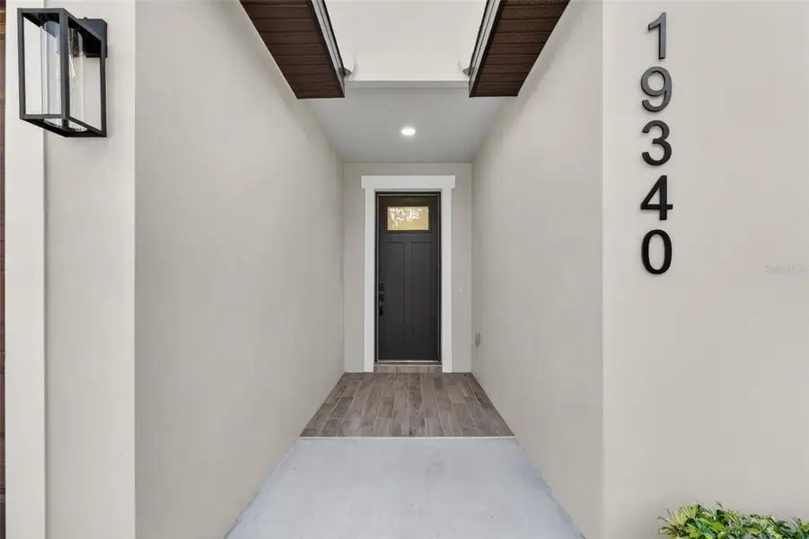 Exterior details and patio area of a home in , Brooksville (Image 32).