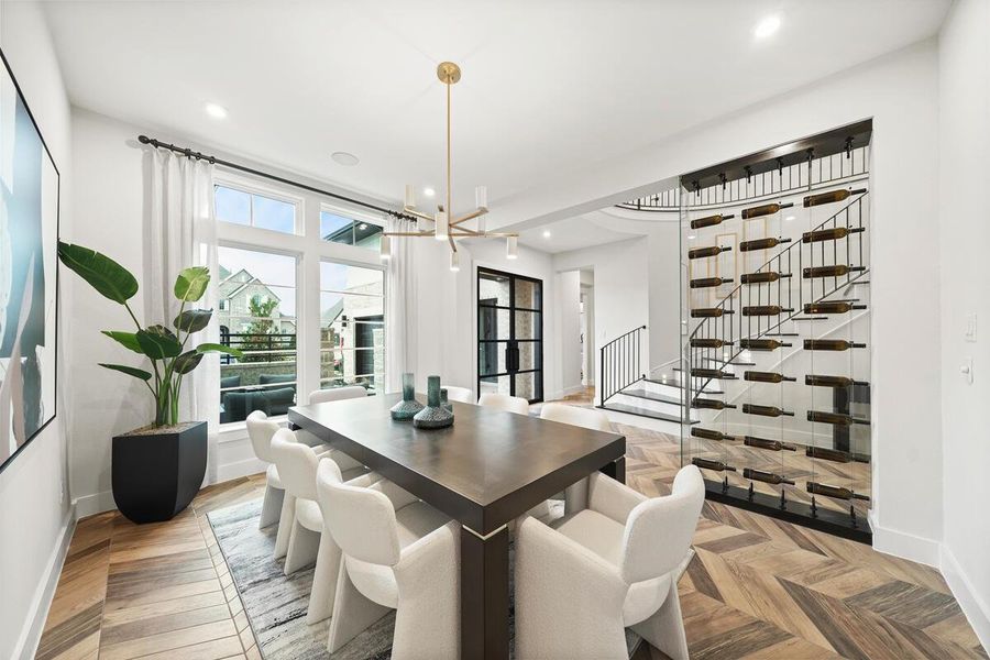 Formal dining with courtyard views. Representative image.