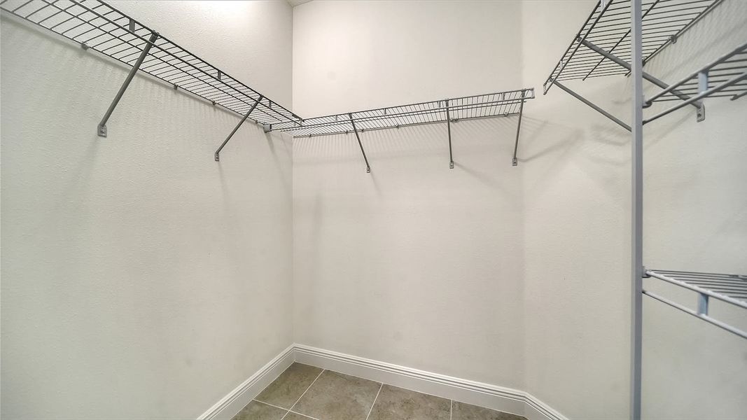 Spacious, unfurnished interior of a new home in Windward Real Estate and Homes for Sale in Sarasota, FL - Neal Communities, Lakewood Ranch (Image 28).