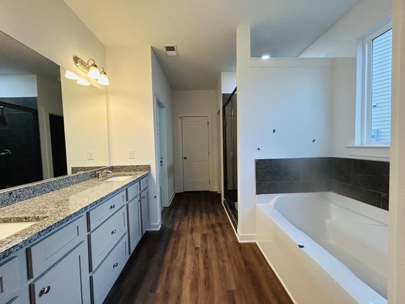 Furnished interior view inside a new home in Sutton's Landing, Statham (Image 7).