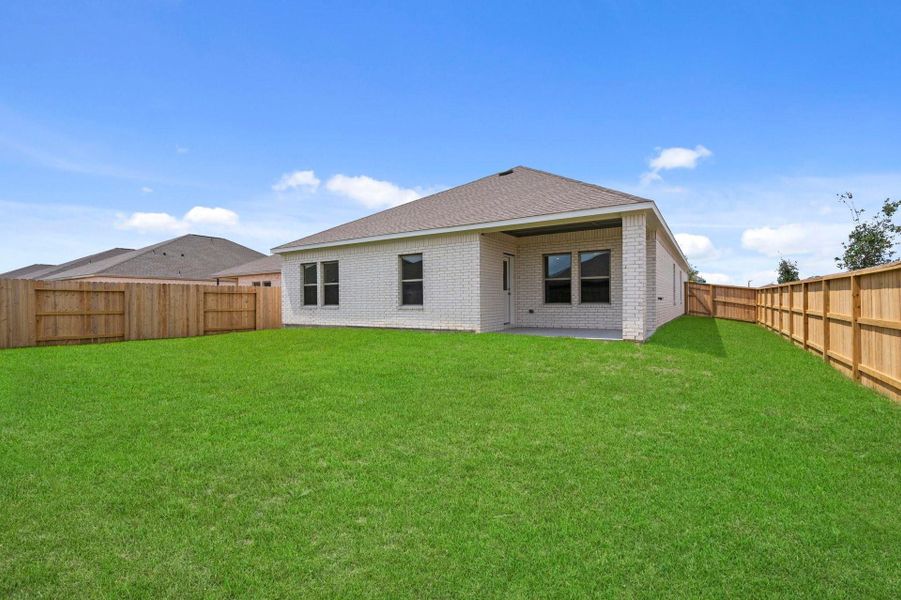 Exterior details and patio area of a home in Windrose Green, Angleton (Image 24). Exterior details and patio area of a home in Windrose Green, Angleton (Image 24).