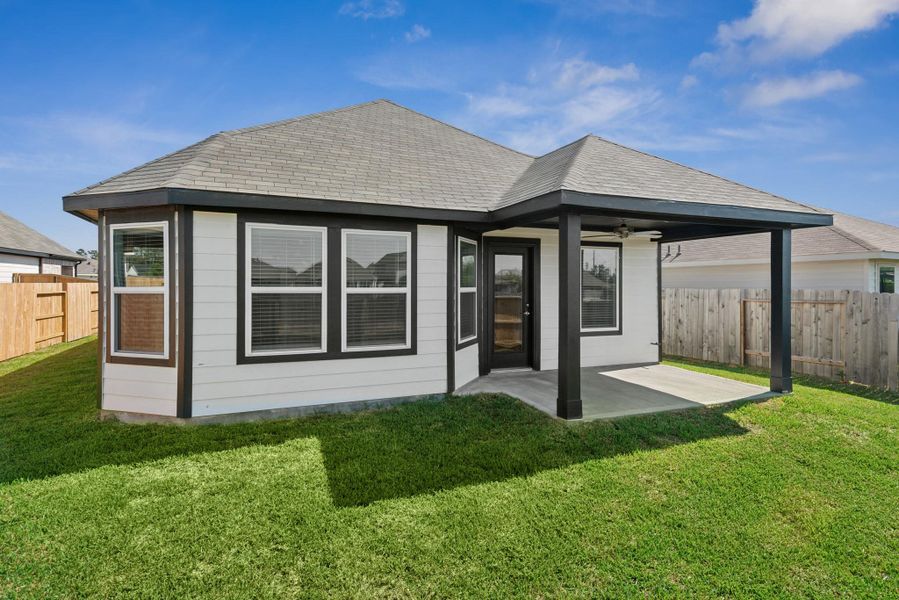 Exterior details and patio area of a home in Magnolia Ridge, Magnolia (Image 3). Exterior details and patio area of a home in Magnolia Ridge, Magnolia (Image 3).