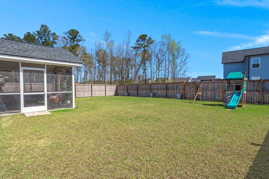 Exterior details and patio area of a home in Lindera Preserve at Cane Bay Plantation, Summerville (Image 3).