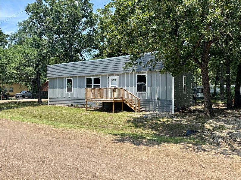 Front exterior of a new home in , Mabank, TX, highlighting curb appeal (Image 14). Front exterior of a new home in , Mabank, TX, highlighting curb appeal (Image 14).
