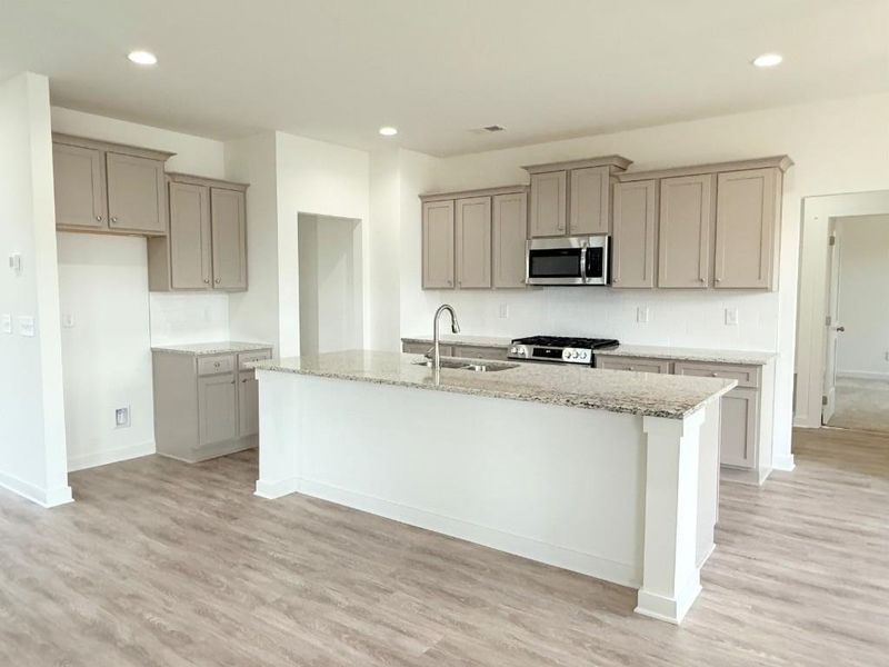 Furnished interior view inside a new home in Sutton's Landing, Statham (Image 10).