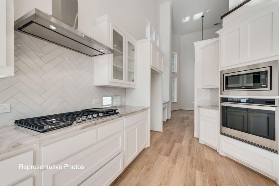 Representative furnished interior of a home built from the Grand Tour by Grand Homes in Providence Cove, McKinney (Image 6).