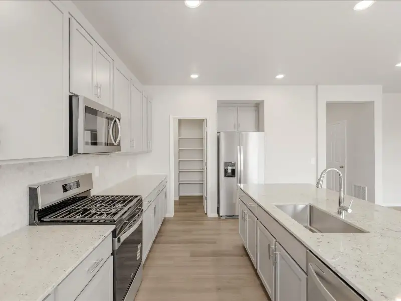 Furnished interior view inside a new home in Paint Brush Hills, Peyton (Image 3).
