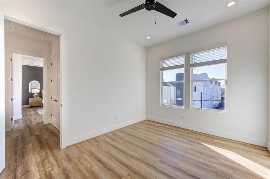 Bedroom 3 on 3rd floor across the hall from the primary. Features a walk-in closet and full bathroom.