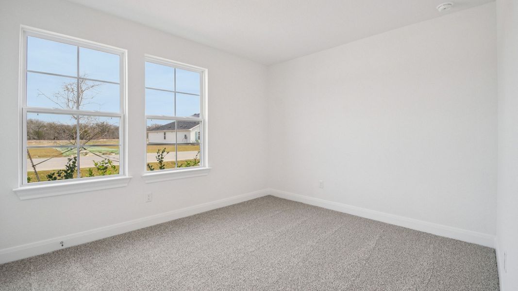 Spacious, unfurnished interior of a new home in Railhead, Cedar Creek (Image 19).