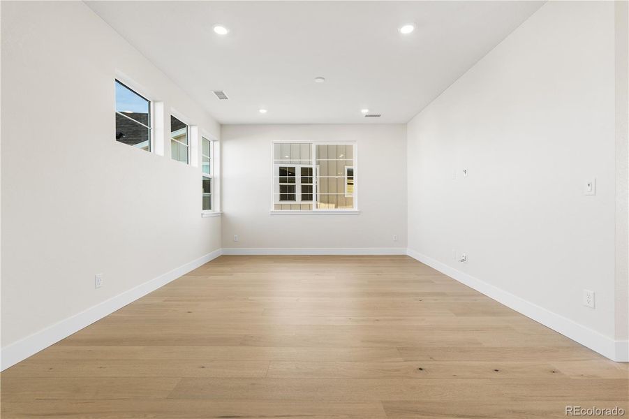 Spacious, unfurnished interior of a new home in Luxe at The Canyons, Castle Pines (Image 44).