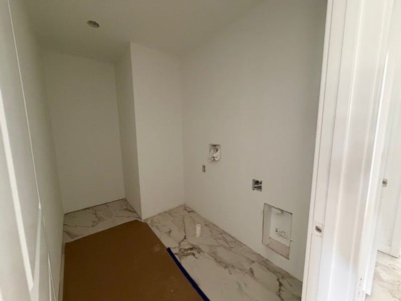 In-progress construction of a new home in Whaley Grove Townhomes, St. Cloud, FL (Image 16).