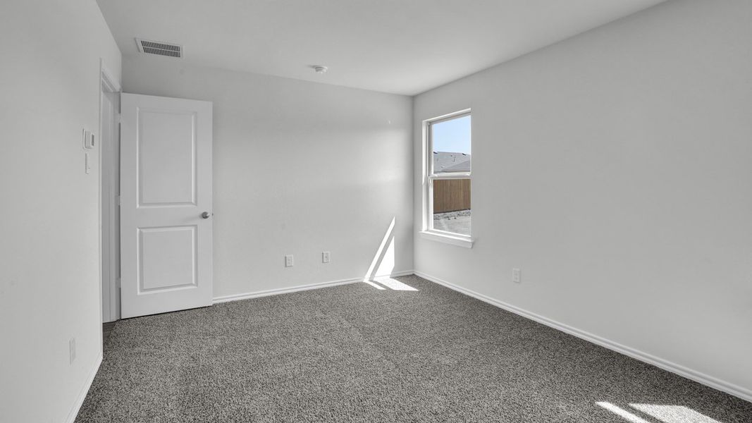 Spacious, unfurnished interior of a new home in Stonewyck Farms, Ennis (Image 22).