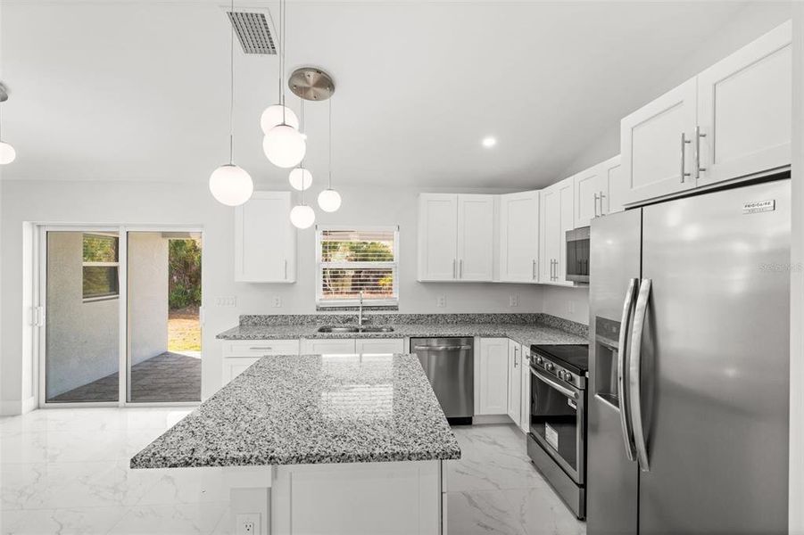 Furnished interior view inside a new home in , Port Charlotte (Image 7).
