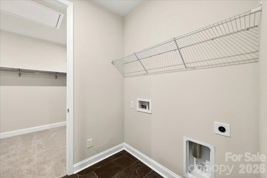 Tiled laundry room Tiled laundry room