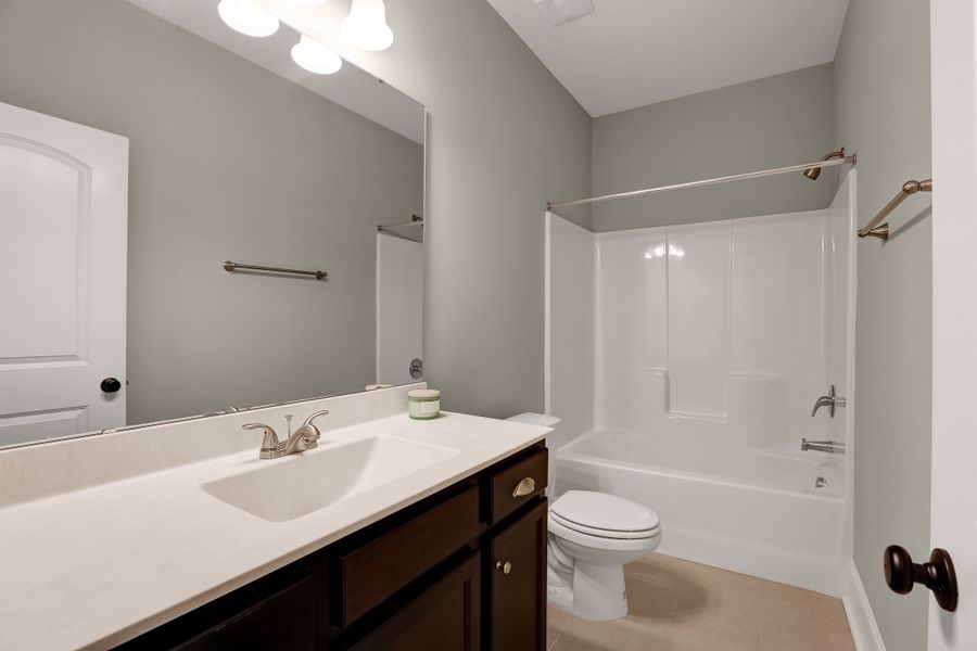 Representative furnished interior of a home built from the Sinclair by Bill Clark Homes in Osprey Landing, Southport (Image 18).